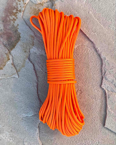 Paracord Ignite - Orange - from Elevated Survival. Paracord 550 with fire starter wick strand and fishing line. For camping, survival, hiking, backpacking, and hunting.